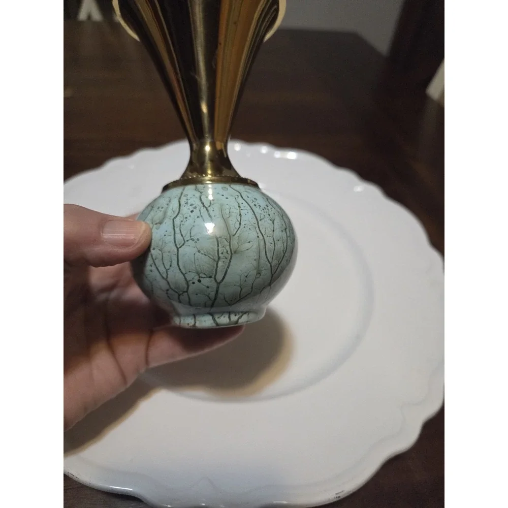 vintage Delft Holland bud vase featuring a brass top